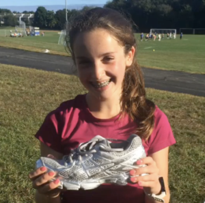 The Salty Shoe Award trophy made from a spray-painted running shoe.